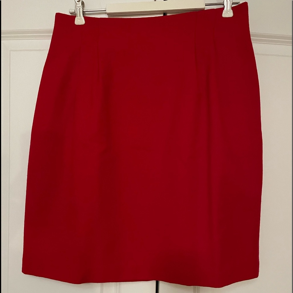 Beautiful red shirt! Fully lined! Side pleats, zipper in back!